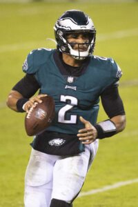 An American football quarterback preparing to throw