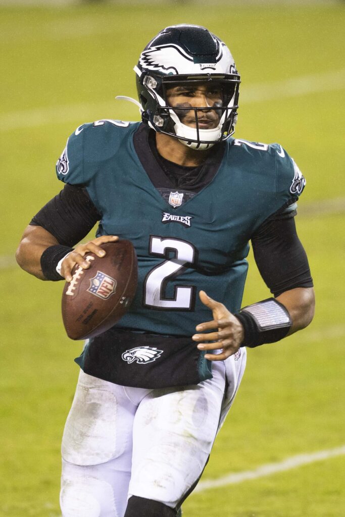 An American football quarterback preparing to throw
