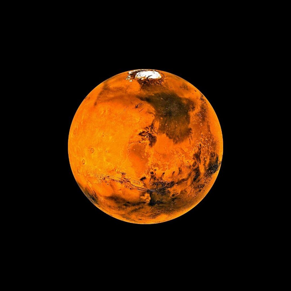 red rocky martian surface under a pale sky